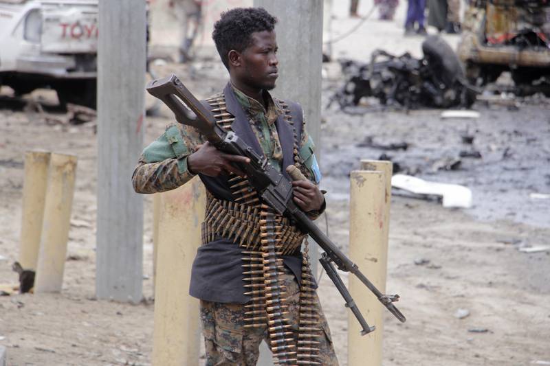 A Somali soldier pictured after a terrorist attack in September last year. Al Shabab have stepped up their attacks after President Hassan Sheikh Mohamud took office in May and vowed an 'all-out war' on the militants. AP