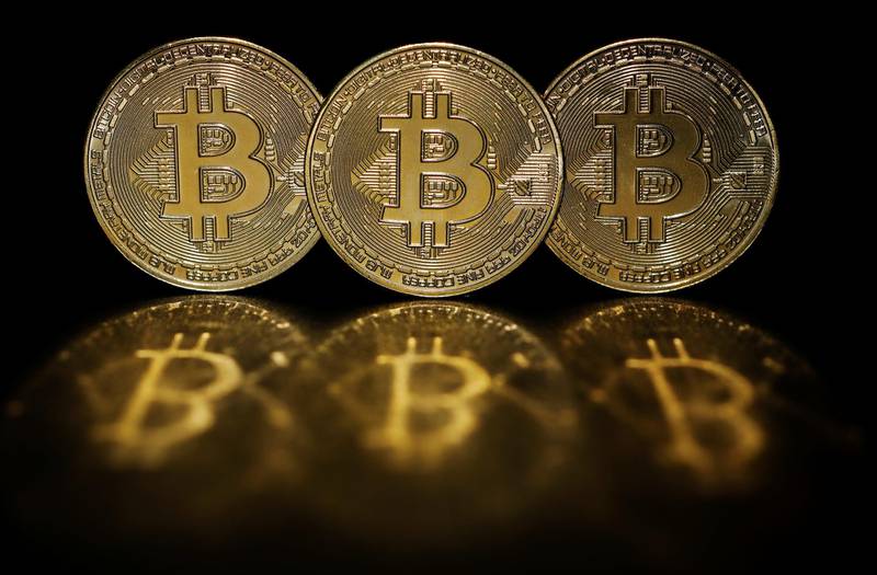 Representations of cryptocurrency Bitcoin are seen in this picture illustration taken June 7, 2021.   REUTERS/Edgar Su/Illustration