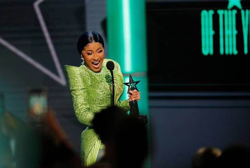 Cardi B accepts the Album of the Year trophy at the Bet Awards in 2019. Reuters