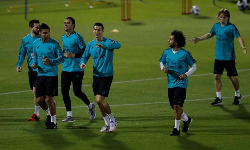 Real Madrid's Cristiano Ronaldo, Casemiro and Marcelo during training. Matthew Childs / Reuters
