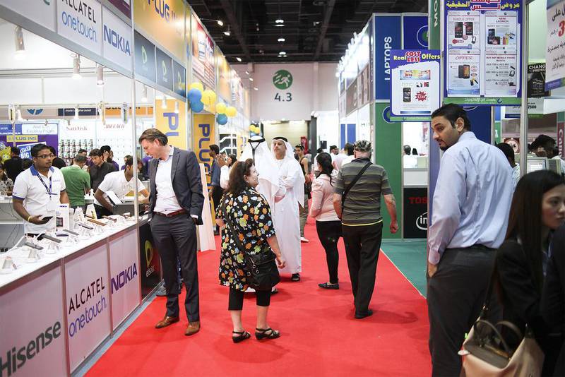 Customers browse the stands at the Abu Dhabi Electronics Shopper  event. Lee Hoagland / The National