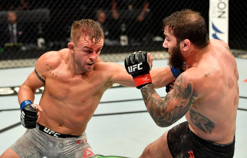 ABU DHABI, UNITED ARAB EMIRATES - JULY 16: (L-R) Cody Stamann punches Jimmie Rivera in their featherweight fight during the UFC Fight Night event inside Flash Forum on UFC Fight Island on July 16, 2020 in Yas Island, Abu Dhabi, United Arab Emirates. (Photo by Jeff Bottari/Zuffa LLC via Getty Images)