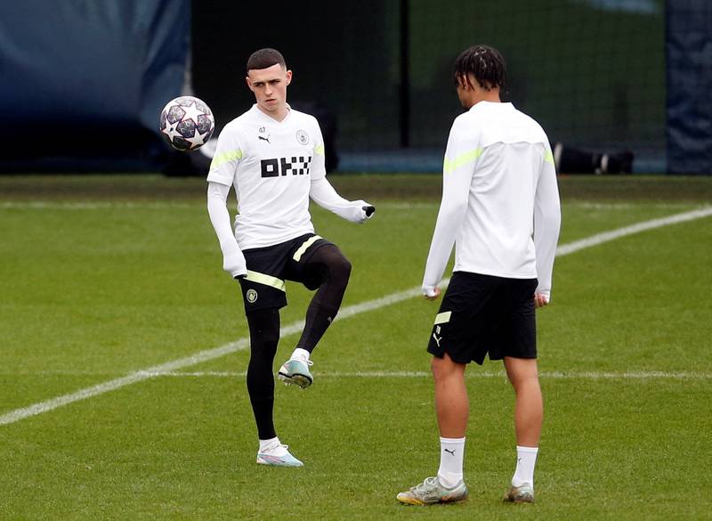 Phil Foden works with the ball at training. Reuters 
