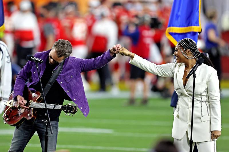 Jazmine Sullivan and Eric Church perform the national anthem before Super Bowl LV. Matthew Emmons
