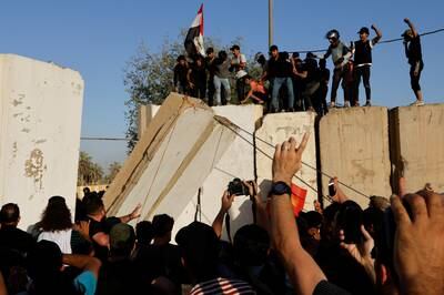 Supporters of Mr Al Sadr protest against corruption in Baghdad. Reuters