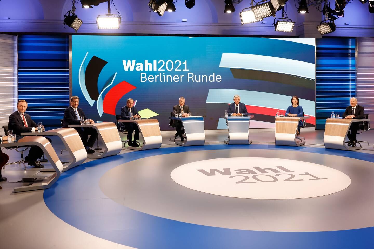 The party leaders held a televised debate in Berlin after the first results came in on Sunday. Getty