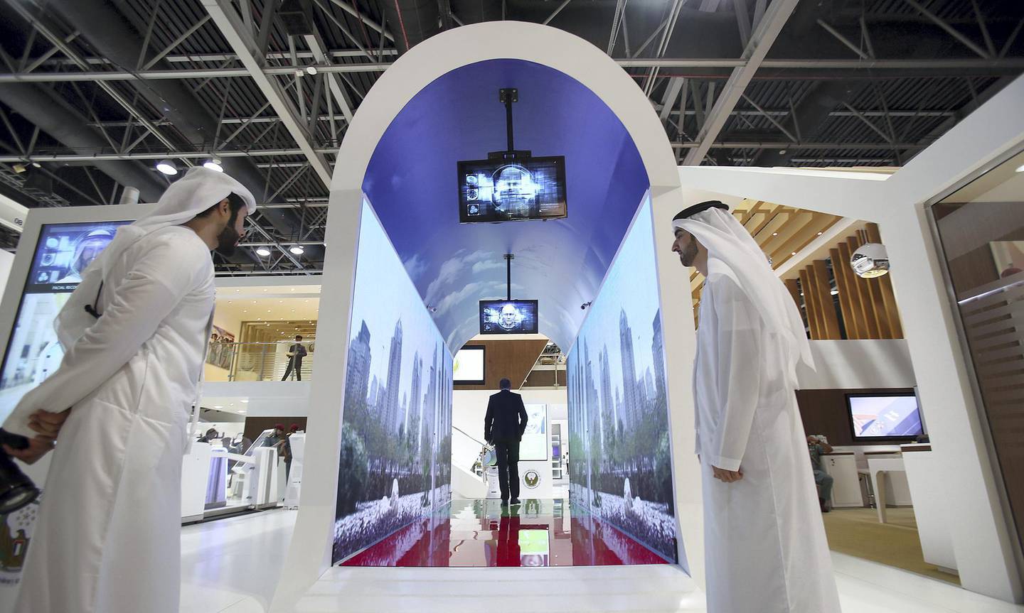 Dubai, 08, Oct, 2017 : Visitors take a look at the new Smart Tunnel at the  Dubai Naturalization and Residency stand during the  37th Gitex Technology Week at the World Trade Centre in Dubai. Satish Kumar / For the National