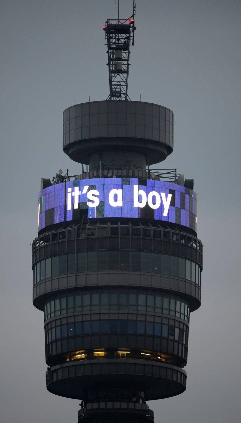 The British Telecom tower displays "it's a boy" to mark the birth of a baby boy for Catherine, Duchess of Cambridge and her husband Prince William, in London July 23, 2013. Already touted as one of the most famous babies in the world, the first child of Prince William and wife Kate faces a life in the spotlight like no previous royal, severely testing the couple's desire to give their offspring a "normal" life.  REUTERS/Paul Hackett (BRITAIN - Tags: ROYALS SOCIETY BUSINESS TELECOMS ENTERTAINMENT) *** Local Caption ***  PMH03_BRITAIN-ROYAL_0723_11.JPG