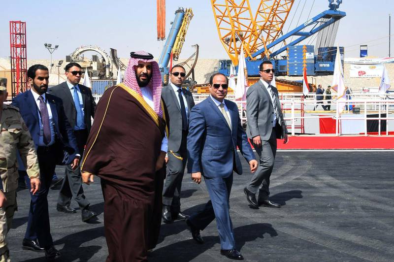 epa06583011 A handout photo made available by the Egyptian Presidency shows Egyptian President Abdel Fattah al-Sisi (R) and Saudi Crown Prince Mohammad Bin Salman (L) visiting the Suez Canal at the city of Ismailia, Egypt, 05 March 2018. Mohammad bin Salman arrived on 04 March on three-day official visit to Egypt.  EPA/EGYPTIAN PRESIDENCY HANDOUT  HANDOUT EDITORIAL USE ONLY/NO SALES