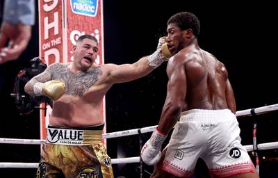 Andy Ruiz Jr  tries to land a left Against Anthony Joshua. PA