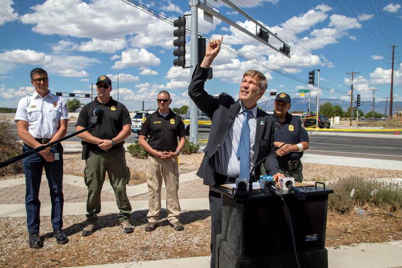Albuquerque Mayor Tim Keller, accompanied by law enforcement officials, indicates the trajectory of the fatal balloon crash during a news conference in Albuquerque, New Mexico. AP Photo
