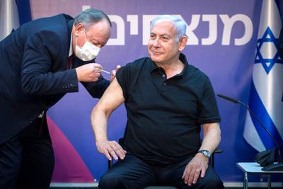 Israeli Prime Minister Minister Benjamin Netanyahu receives the second dose of the coronavirus disease (COVID-19) vaccine at Sheba Medical Center in Ramat Gan, near the coastal city of Tel Aviv, on January 9, 2021. (Photo by Miriam ALSTER / POOL / AFP)