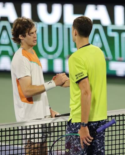 Andrey Rublev of Russia shake hands with Hubert Hurkacz of Poland after their match. EPA 
