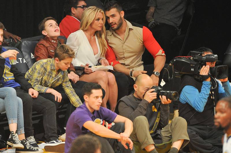 Britney Spears and Sam Asghari, with her sons Sean Federline and Jayden James Federline, attend a basketball game between the Los Angeles Lakers and the Golden State Warriors in November 2017. Getty Images