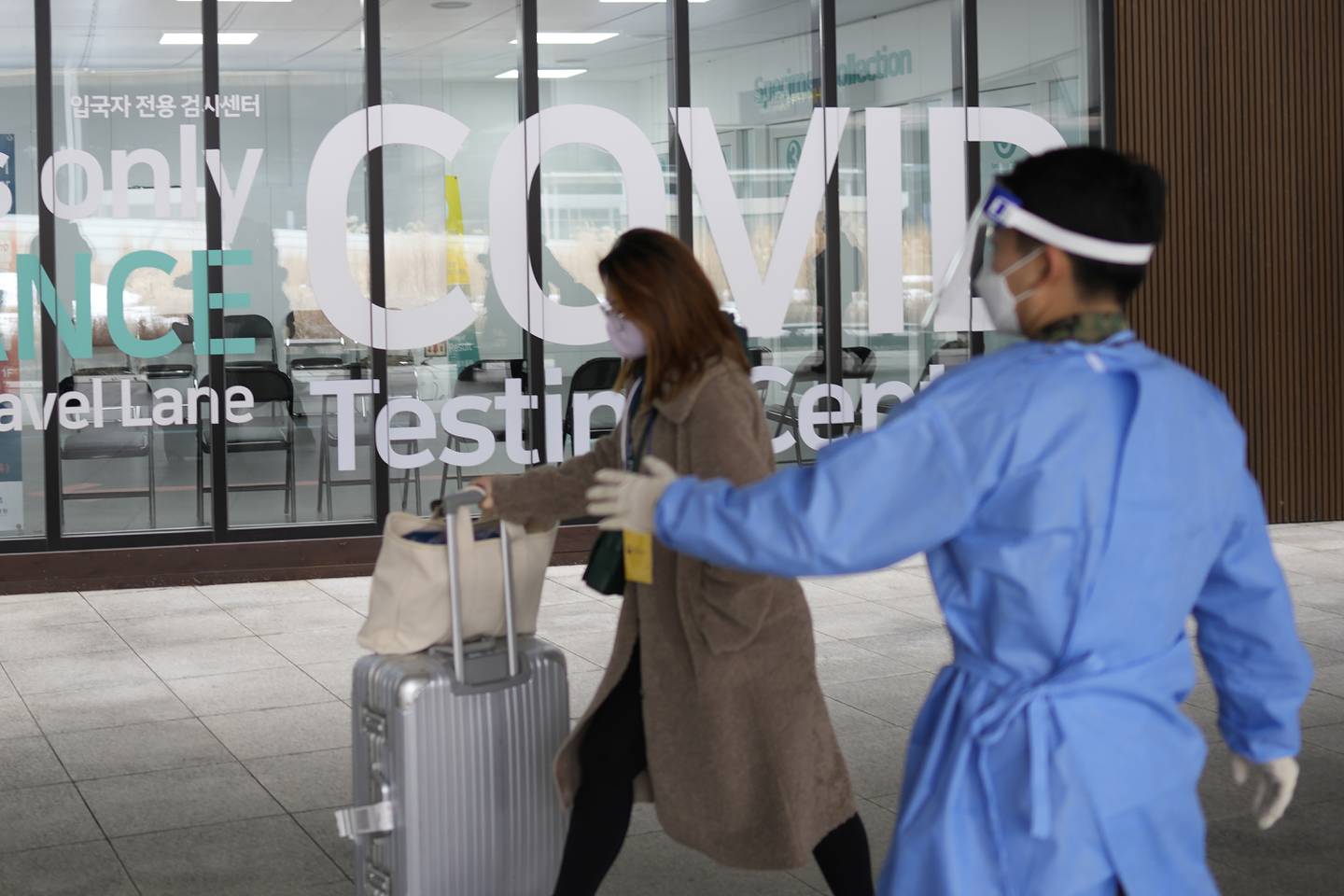 Covid-19 tests are no longer required for most travellers before flights, but should you still be taking one? AP 