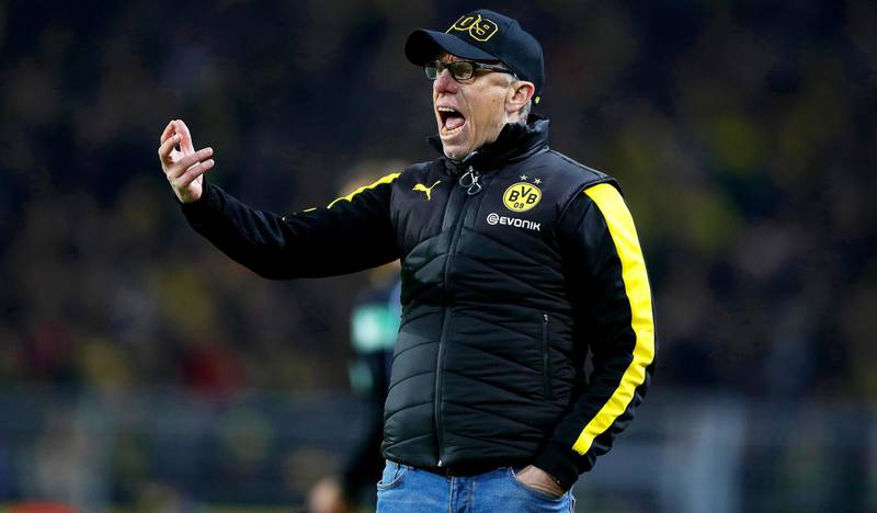 epa06394344 Dortmund's head coach Peter Stoeger reacts during the German Bundesliga soccer match between Borussia Dortmund and TSG Hoffenheim in Dortmund, Germany, 16 December 2017.  EPA/FRIEDEMANN VOGEL EMBARGO CONDITIONS - ATTENTION: Due to the accreditation guidelines, the DFL only permits the publication and utilisation of up to 15 pictures per match on the internet and in online media during the match.