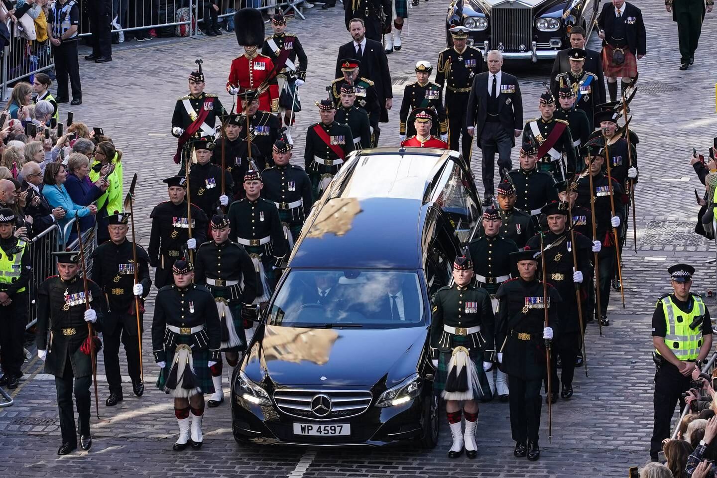 King Charles III joins the procession accompanying Queen Elizabeth II's coffin from the Palace of Holyroodhouse along the Royal Mile to St Giles Cathedral in Edinburgh. Getty Images
