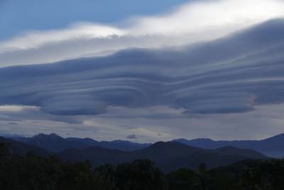 Lenticular clouds above mountains near Cognocoli-Monticchi on the French Mediterranean island of Corsica. AFP
