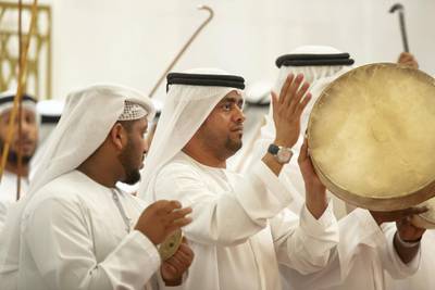ABU DHABI, UNITED ARAB EMIRATES - February 3, 2019: Day one of the UAE papal visit - A Traditional Ayala dance is performed during the arrival of His Holiness Pope Francis, Head of the Catholic Church (not shown), and His Eminence Dr Ahmad Al Tayyeb, Grand Imam of the Al Azhar Al Sharif (not shown), at Presidential Airport. 
( Ryan Carter / Ministry of Presidential Affairs )
---