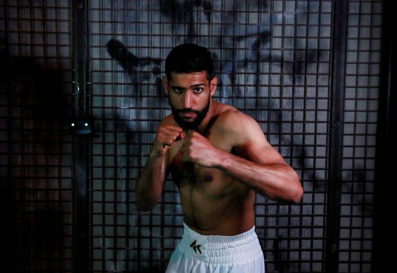 Amir Khan poses during the media work-out day. Reuters