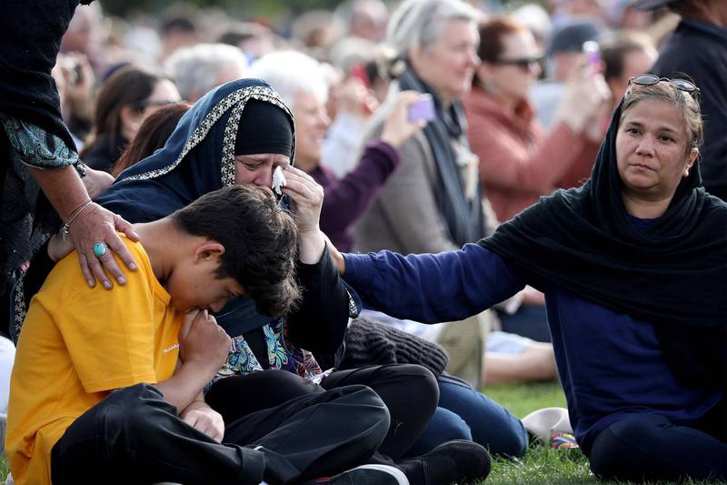 Members of the Muslim community attend the National Remembrance Service at North Hagley Park in Christchurch on March 29, 2019.  The remembrance ceremony is being held in memory of the 50 lives that were lost in the March 15th mosque shootings in Christchurch. / AFP / Sanka VIDANAGAMA
