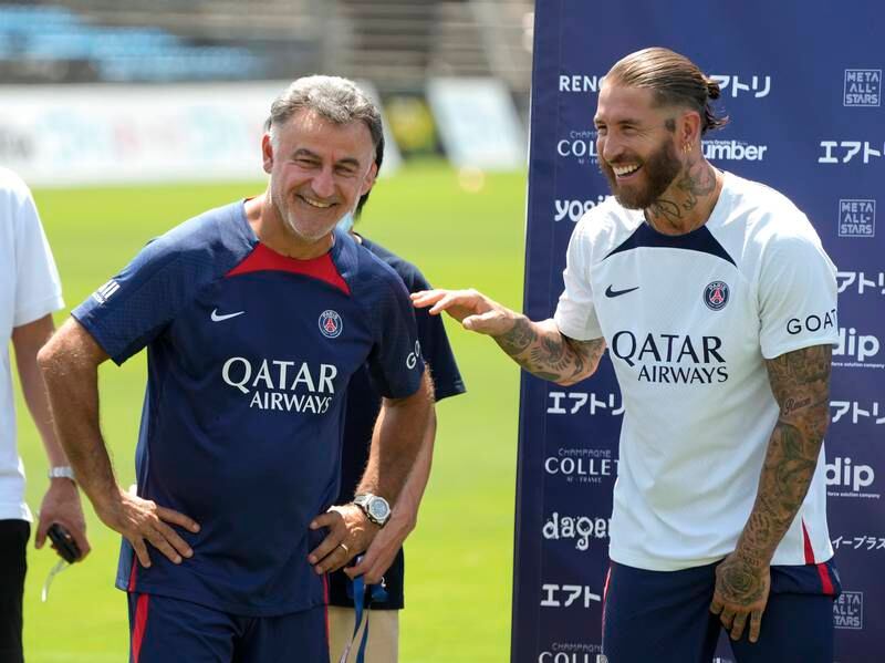 Sergio Ramos talks with PSG head coach Christophe Galtier during the PSG kids soccer clinic in Tokyo, Japan. EPA