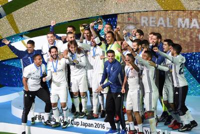 Real Madrid celebrate after winning the Club World Cup final against Kashima Antlers of Japan at Yokohama International stadium on December 18, 2016. AFP 