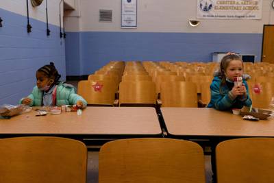 Pupils eat lunch at school as Covid-19 restrictions are lifted in Philadelphia, Pennsylvania, USA. Reuters