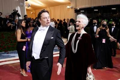 Mother and son pose and laugh on the Met Gala red carpet. EPA
