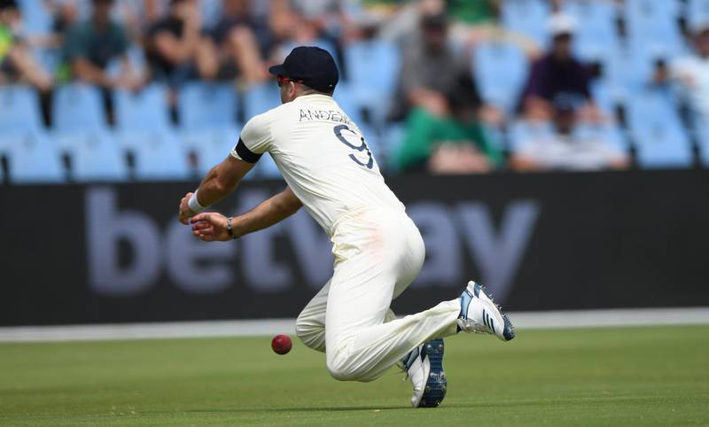 England bowler James Anderson dives in vain to catch Quinton de Kock . Getty Images