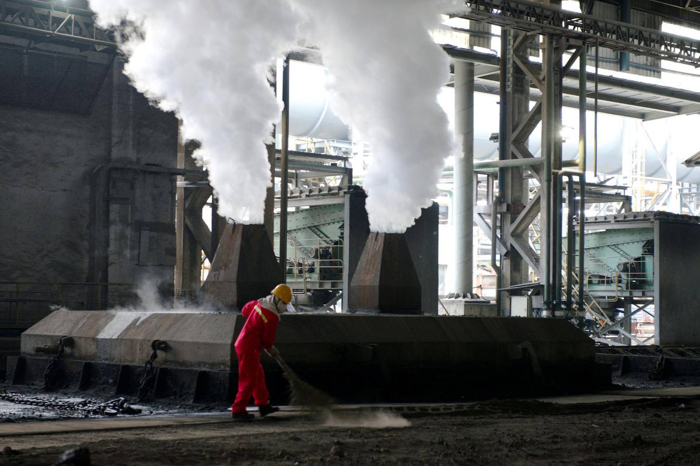 FILE PHOTO: A worker is seen at the workshop of a steel mill in Huaian, Jiangsu province, China August 4, 2018. REUTERS/Stringer/File Photo ATTENTION EDITORS - THIS IMAGE WAS PROVIDED BY A THIRD PARTY. CHINA OUT.