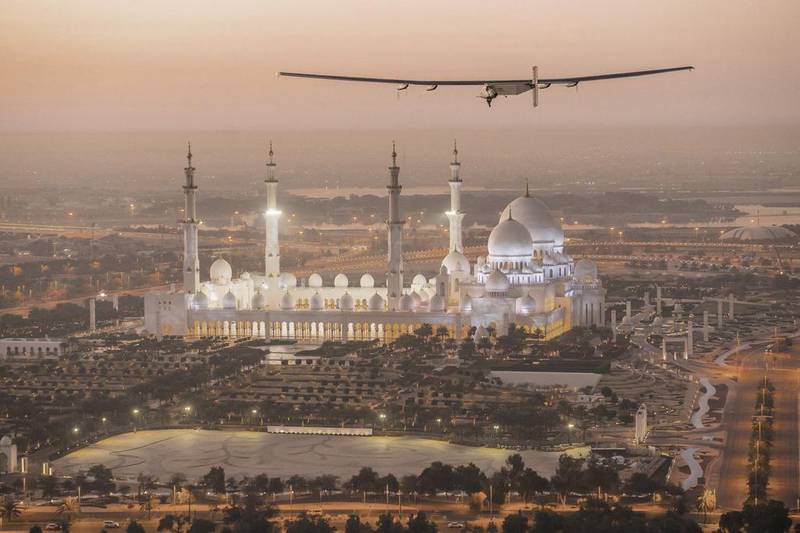 The Solar Impulse 2, a solar-powered plane, flies over Abu Dhabi’s Sheikh Zayed Grand Mosque in preparation for next month’s round-the-world flight. The plane has a wingspan of 72 metres, larger than that of a Boeing 747, but weighs only 2.3 tonnes. Reuters