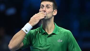 An image that illustrates this article Djokovic through to ATP Finals semis after receiving Australia visa