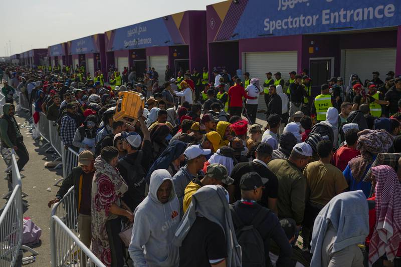 Morocco fans queue for tickets outside of Al Janoub Stadium in Qatar. AP