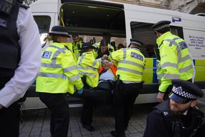 The Whitehall protesters were detained and handcuffed near the Cenotaph. PA
