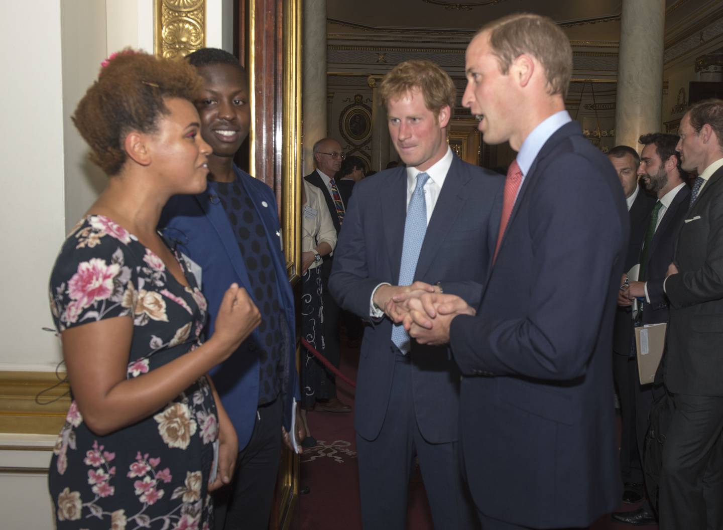 Jamal Edwards, second left, and DJ Gemma Cairney meet with Prince William and Prince Harry at Buckingham Palace in London during the launch of the Queen's Young Leaders Programme on September 7, 2014. 