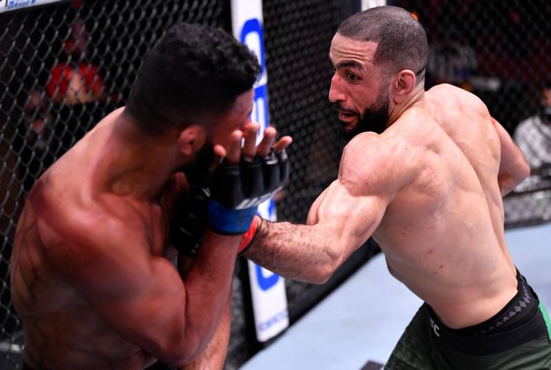 LAS VEGAS, NEVADA - FEBRUARY 13: (R-L) Belal Muhammad punches Dhiego Lima of Brazil in their welterweight fight during the UFC 258 event at UFC APEX on February 13, 2021 in Las Vegas, Nevada. (Photo by Jeff Bottari/Zuffa LLC) *** Local Caption *** LAS VEGAS, NEVADA - FEBRUARY 13: (R-L) Belal Muhammad punches Dhiego Lima of Brazil in their welterweight fight during the UFC 258 event at UFC APEX on February 13, 2021 in Las Vegas, Nevada. (Photo by Jeff Bottari/Zuffa LLC)