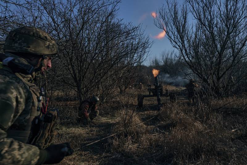 Ukrainian soldiers fire at Russian positions at the frontline near Bakhmut in the Donetsk region. AP