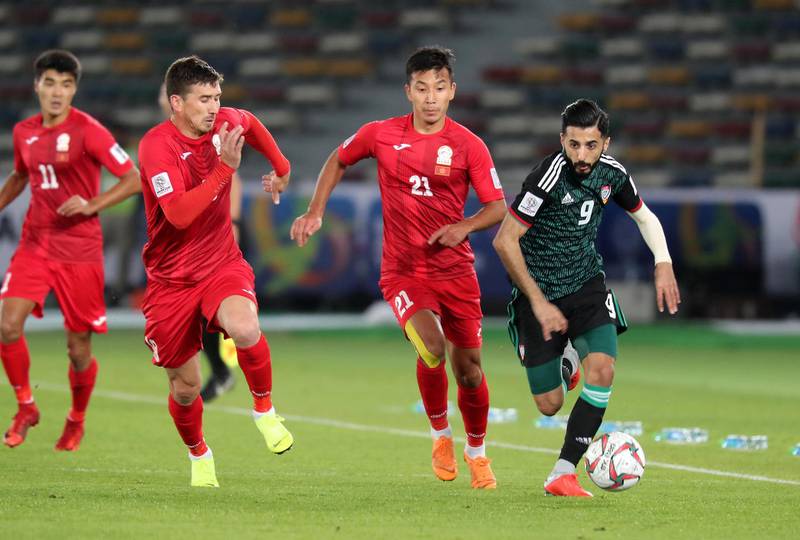 ABU DHABI , UNITED ARAB EMIRATES , January 21 – 2019 :- Bandar Mohamed Al Ahbabi ( no 9 in green UAE ) in action during the AFC Asian Cup UAE 2019 football match between UNITED ARAB EMIRATES vs. KYRGYZ REPUBLIC held at Zayed Sports City in Abu Dhabi. ( Pawan Singh / The National ) For News/Sports