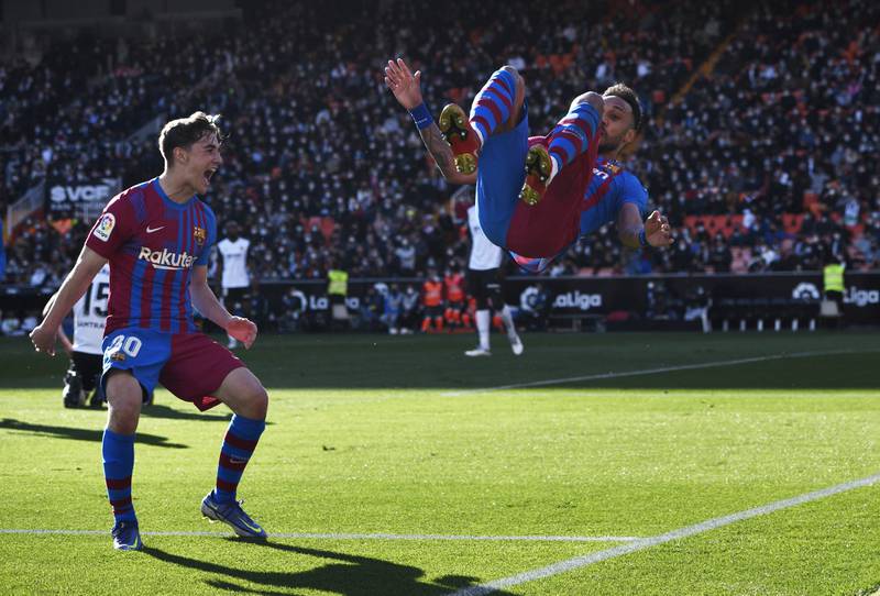 Barcelona's Pierre-Emerick Aubameyang celebrates scoring their first goal with Gavi. Reuters