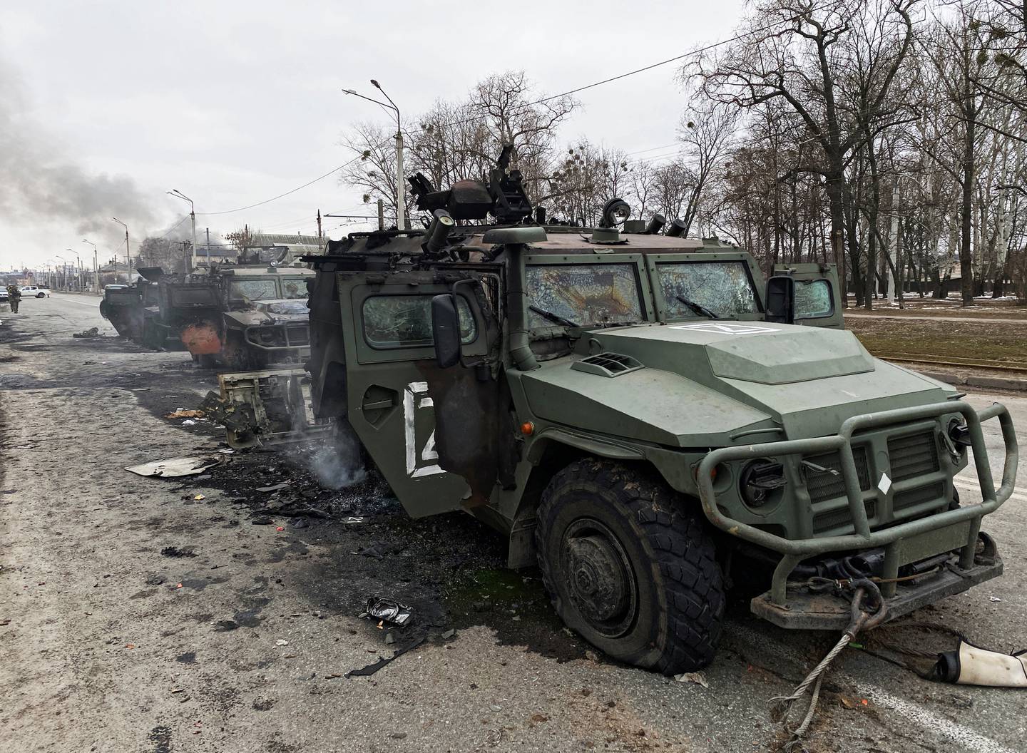 A destroyed Russian TIGR vehicle on a road in Kharkiv, Ukraine. Reuters