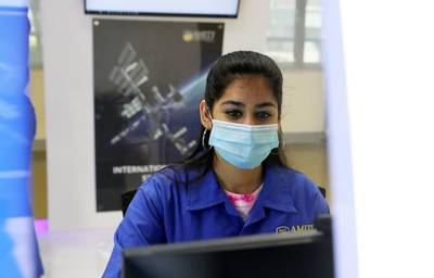 DUBAI, UNITED ARAB EMIRATES , September 21 – 2020 :- Chhavi Jain student of Aerospace Engineering working in the Satellite Ground Station at the Aerospace Lab at the Amity University in Academic City in Dubai.  (Pawan Singh / The National) For News. Story by Sarwat