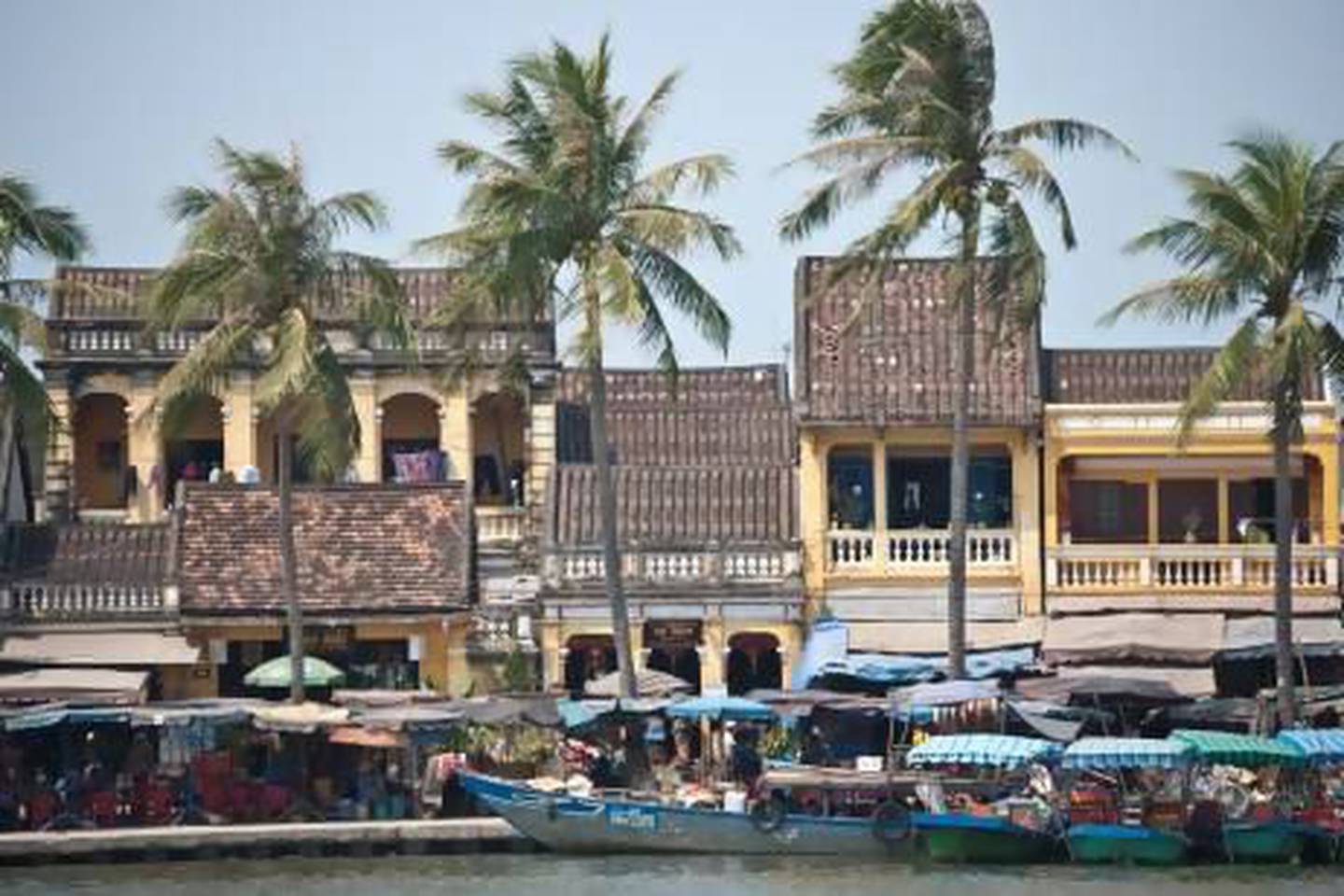 Shop houses along the riverfront in Hoi An, a Unesco World Heritage Site in Vietnam. Getty Images / Lonely Planet Images