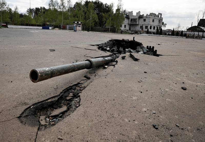 The turret of a destroyed Russian tank stuck in the ground in Zalissia, near Kyiv, Ukraine. Reuters