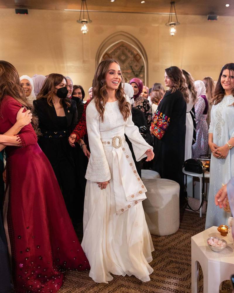 Princess Iman, 26, wears an embroidered white dress by Reema Dahbour, a Jordanian-Palestinian fashion designer