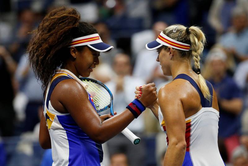 Tennis - US Open - New York, U.S. - August 29, 2017 - Naomi Osaka of Japan and Angelique Kerber of Germany shake hands after their first round match. REUTERS/Mike Segar