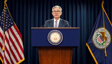 FILE PHOTO: U.S. Federal Reserve Chairman Jerome Powell speaks to reporters after the Federal Reserve cut interest rates in an emergency move designed to shield the world's largest economy from the impact of the coronavirus, in Washington, U.S., March 3, 2020. REUTERS/Kevin Lamarque/File Photo