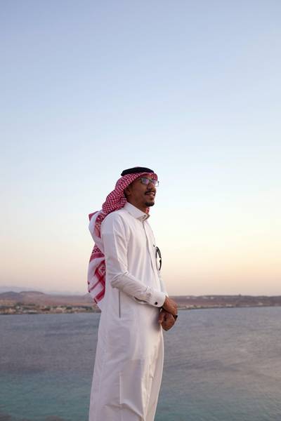 TABUK, KINGDOM OF SAUDI ARABIA. 30 SEPTEMBER 2019. Mohammed, 27, a biology teacher from Tabuk watches the sun set in Haql. Haql is home to many chalets, coral reefs, and marine habitats that are found along the city’s beaches. (Photo: Reem Mohammed/The National)Reporter:Section: