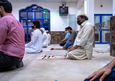 Worshippers at the Souq Al Anshetah Masjid during Maghrib, Al Mina in Abu Dhabi on April 26th, 2021. Victor Besa / The National.
