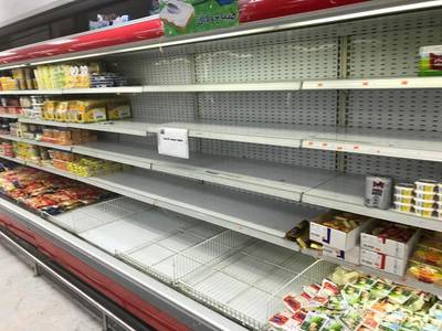 French products are taken off shelves after Kuwaiti supermarkets boycotted the country's goods, in Kuwait City. Reuters